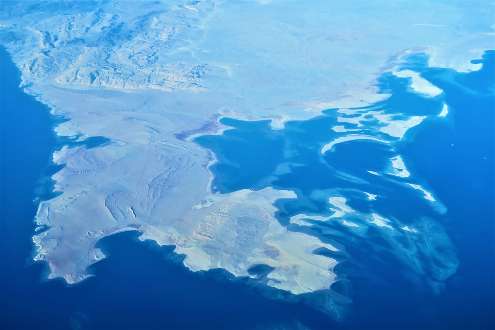 an aerial view of an island in the ocean