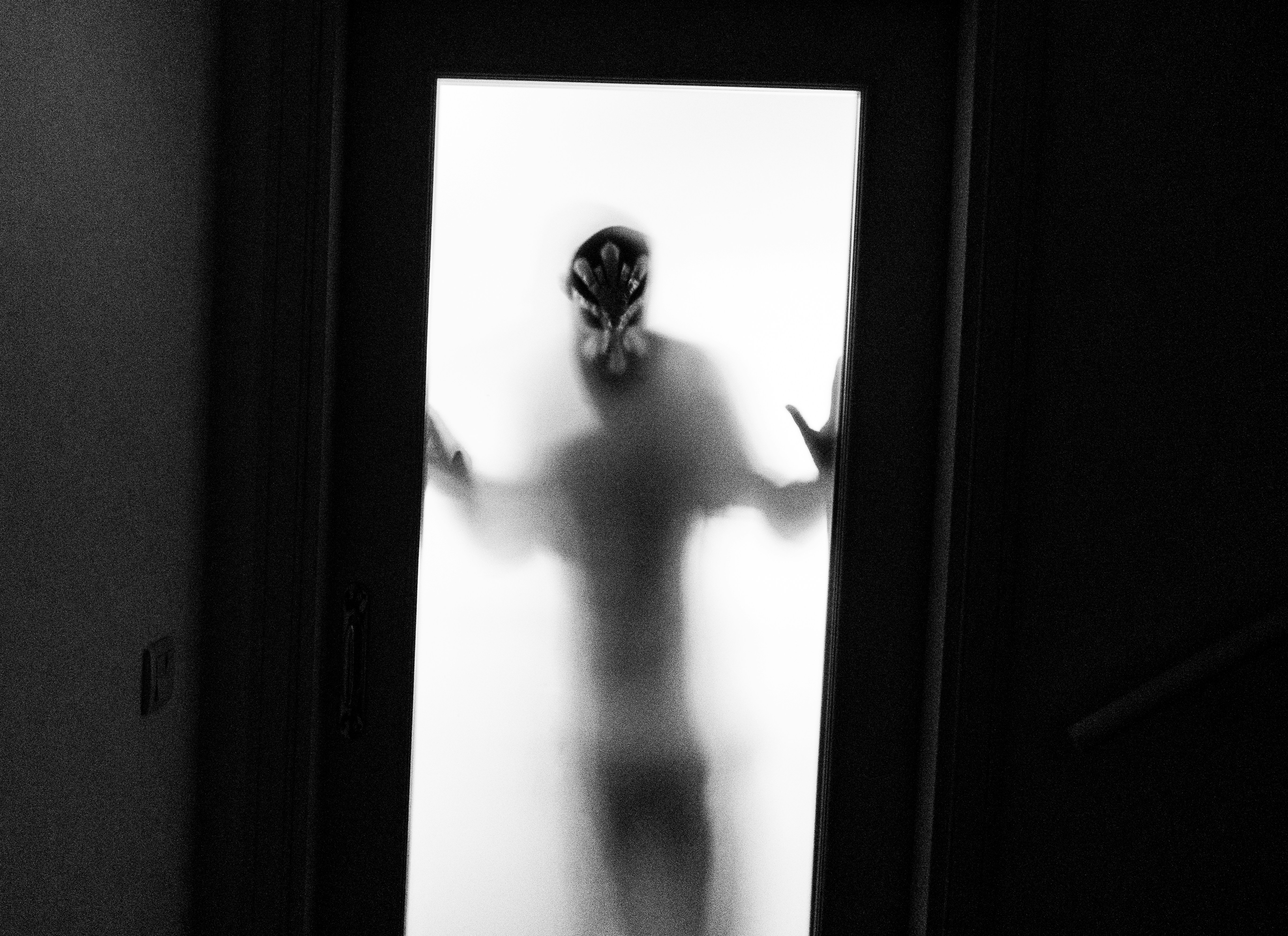 a person standing in front of a door