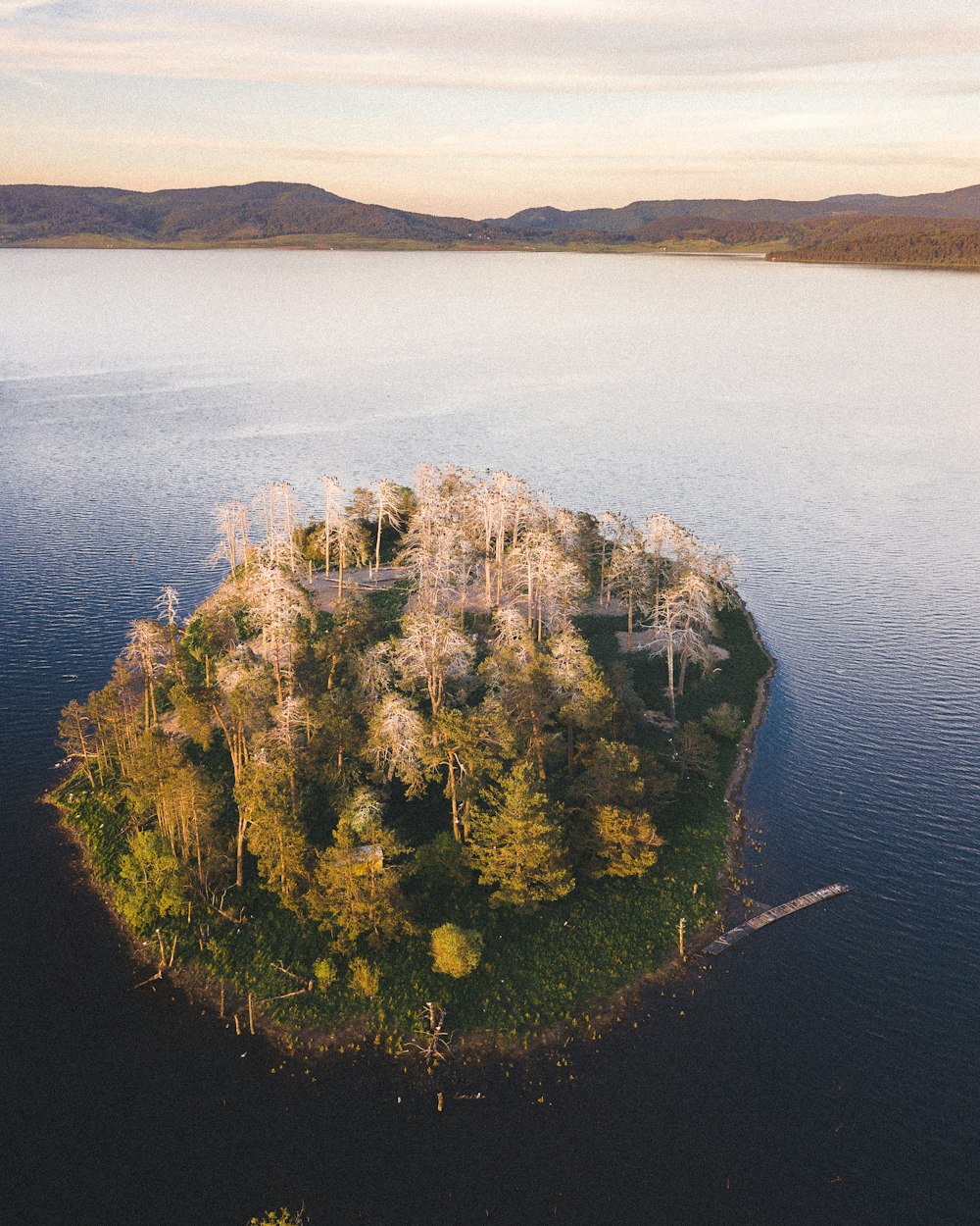 a small island in the middle of a lake