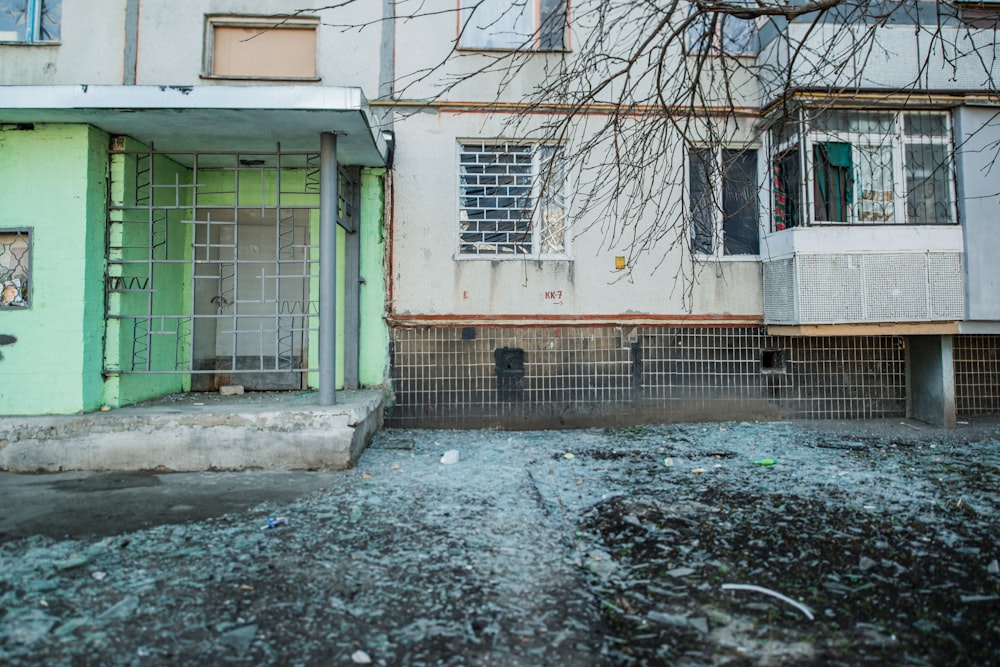 a run down building with a broken window