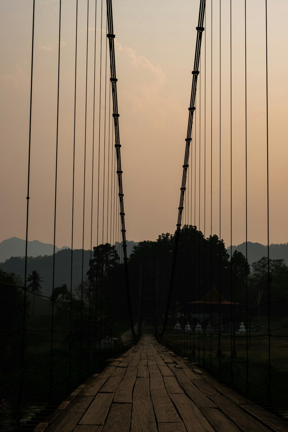 a view of a bridge with a sky in the background