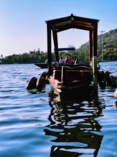 a boat floating on top of a body of water