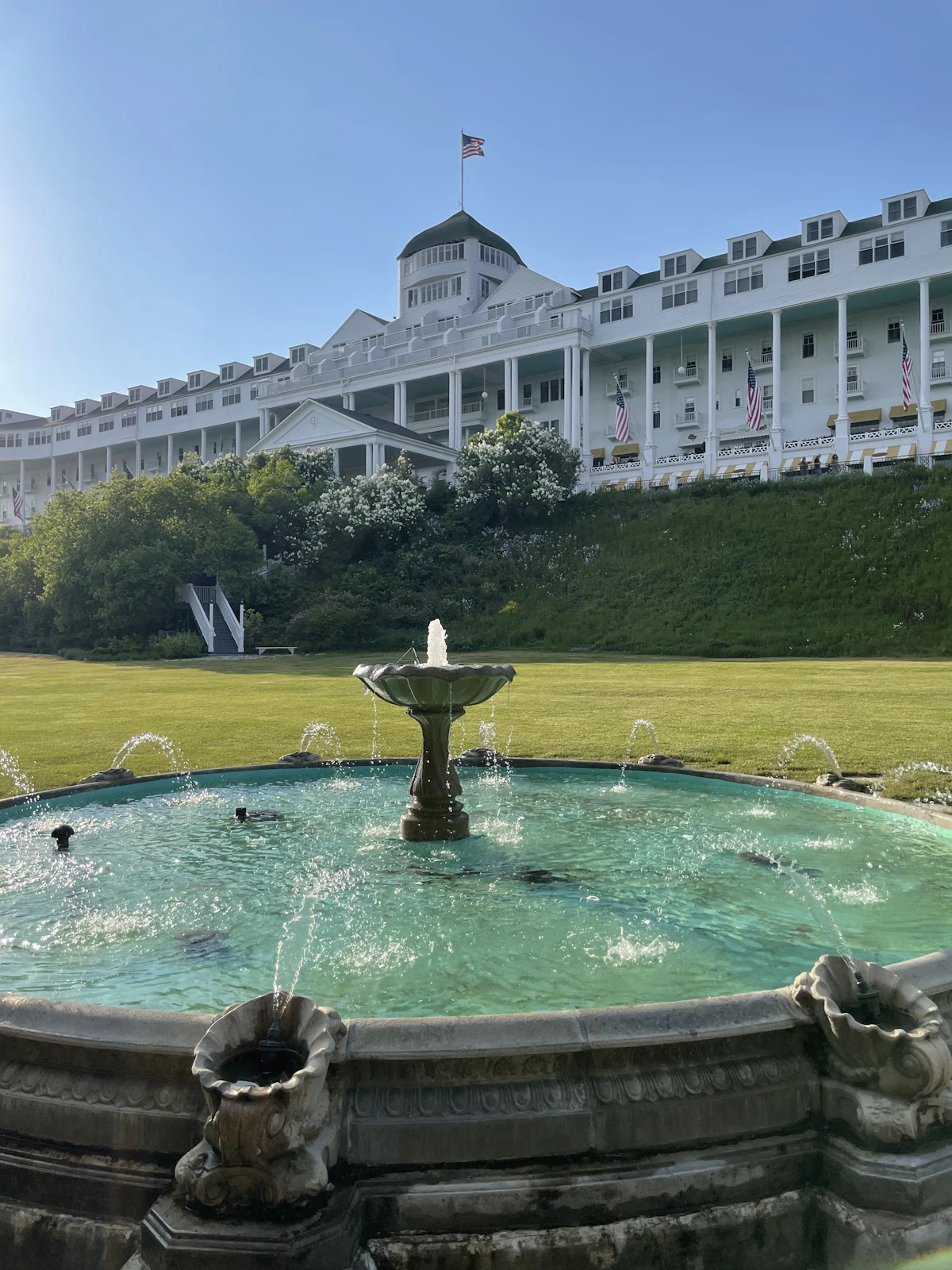Grand Hotel on Mackinac Island with its iconic white facade and fountain