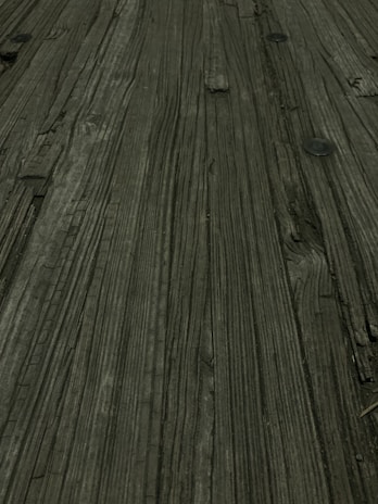 Close-up of handcrafted industrial furniture details showcasing wood grain and metal joints.