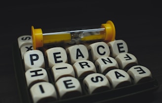 a close up of a typewriter with a pill on top of it