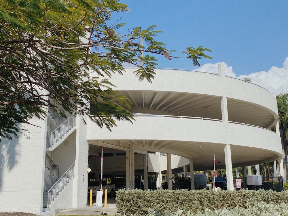 a large white building with a spiral design