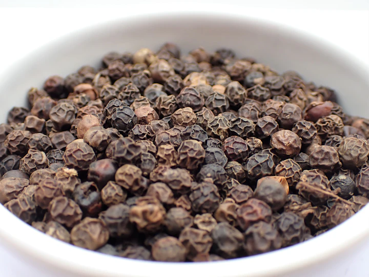 Black peppercorns — visual inspiration for Pepper