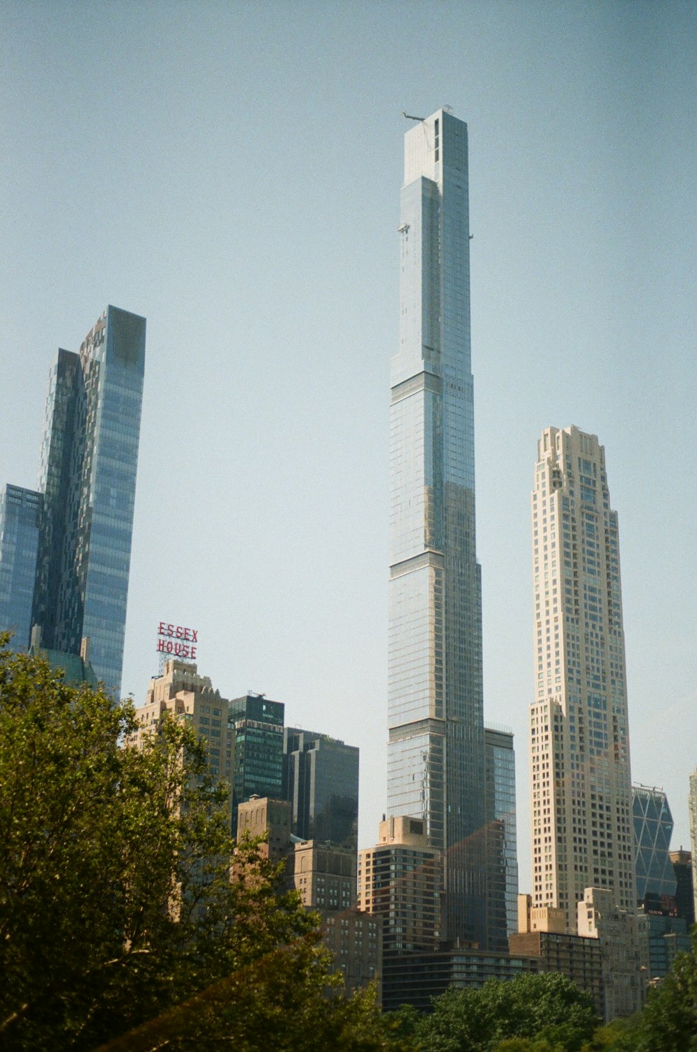a view of a very tall building in the city
