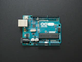 a close up of a small electronic device on a table
