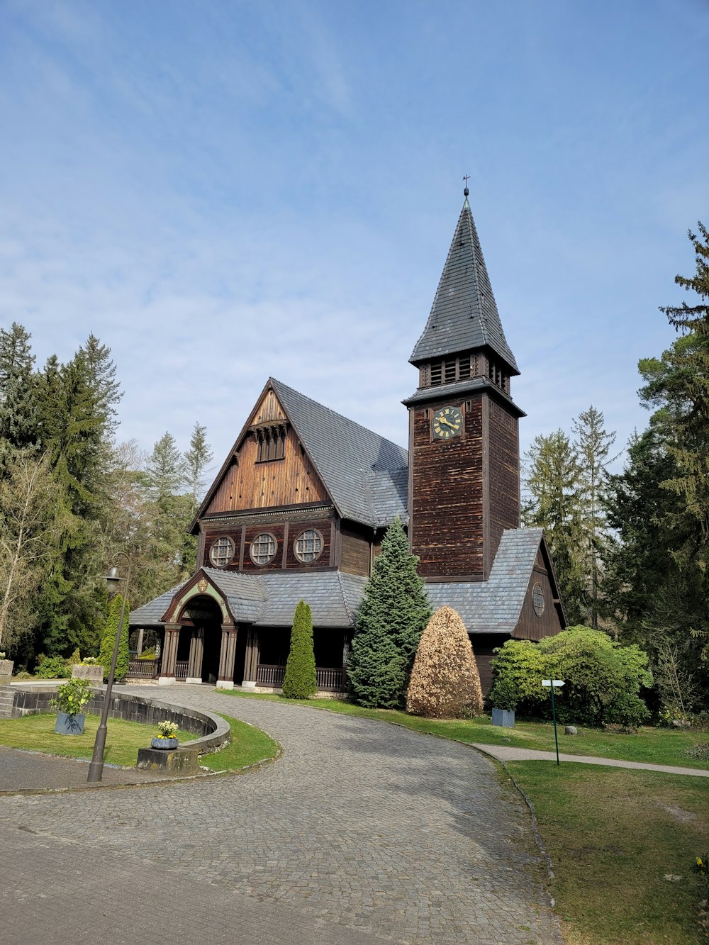 a church with a clock on the front of it