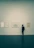 Close-up of a minimalist gallery corner with warm-colored frames.
