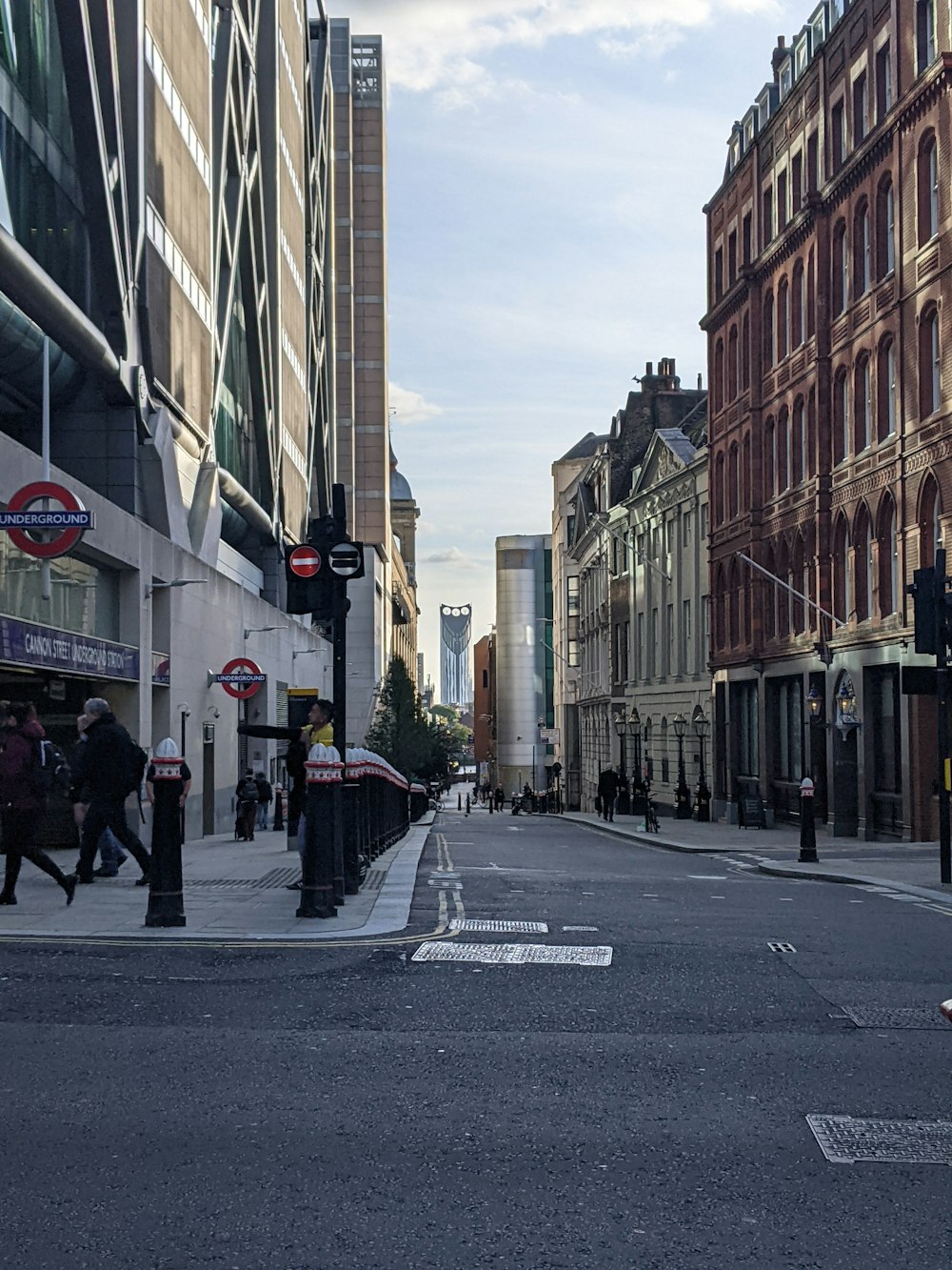 a city street filled with lots of tall buildings