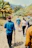 Group of tourists happily exploring a scenic Punta Cana excursion with lush greenery around.