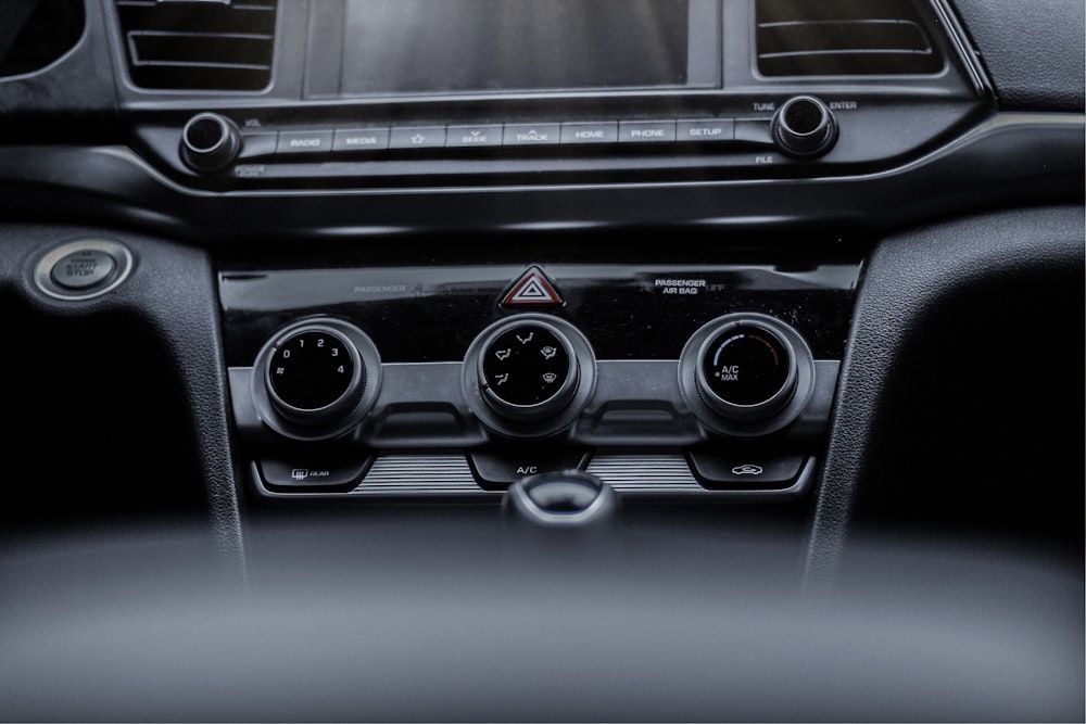 the dashboard of a car with three gauges