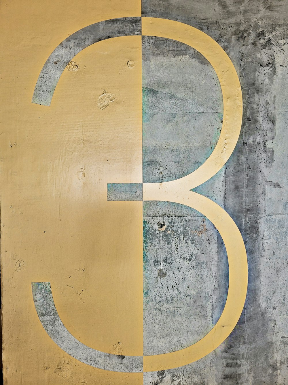the number five painted on the side of a building