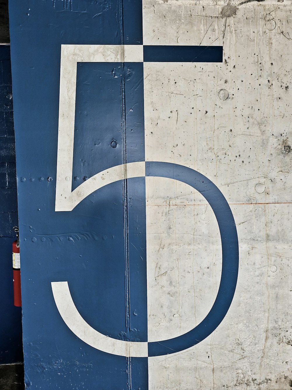 a close up of the number five on a plane