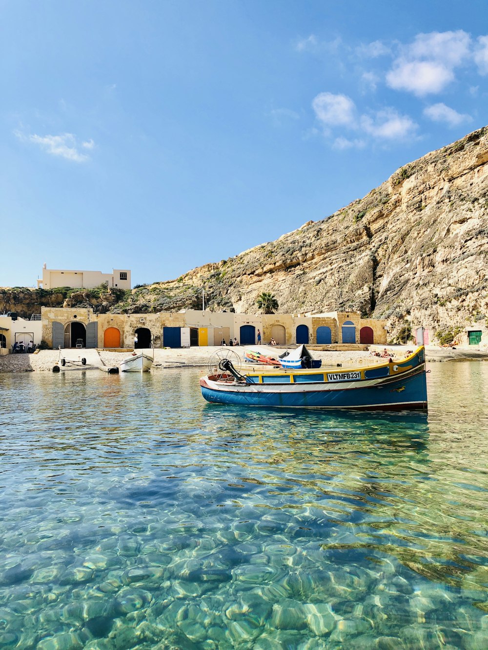 a boat floating on top of a body of water