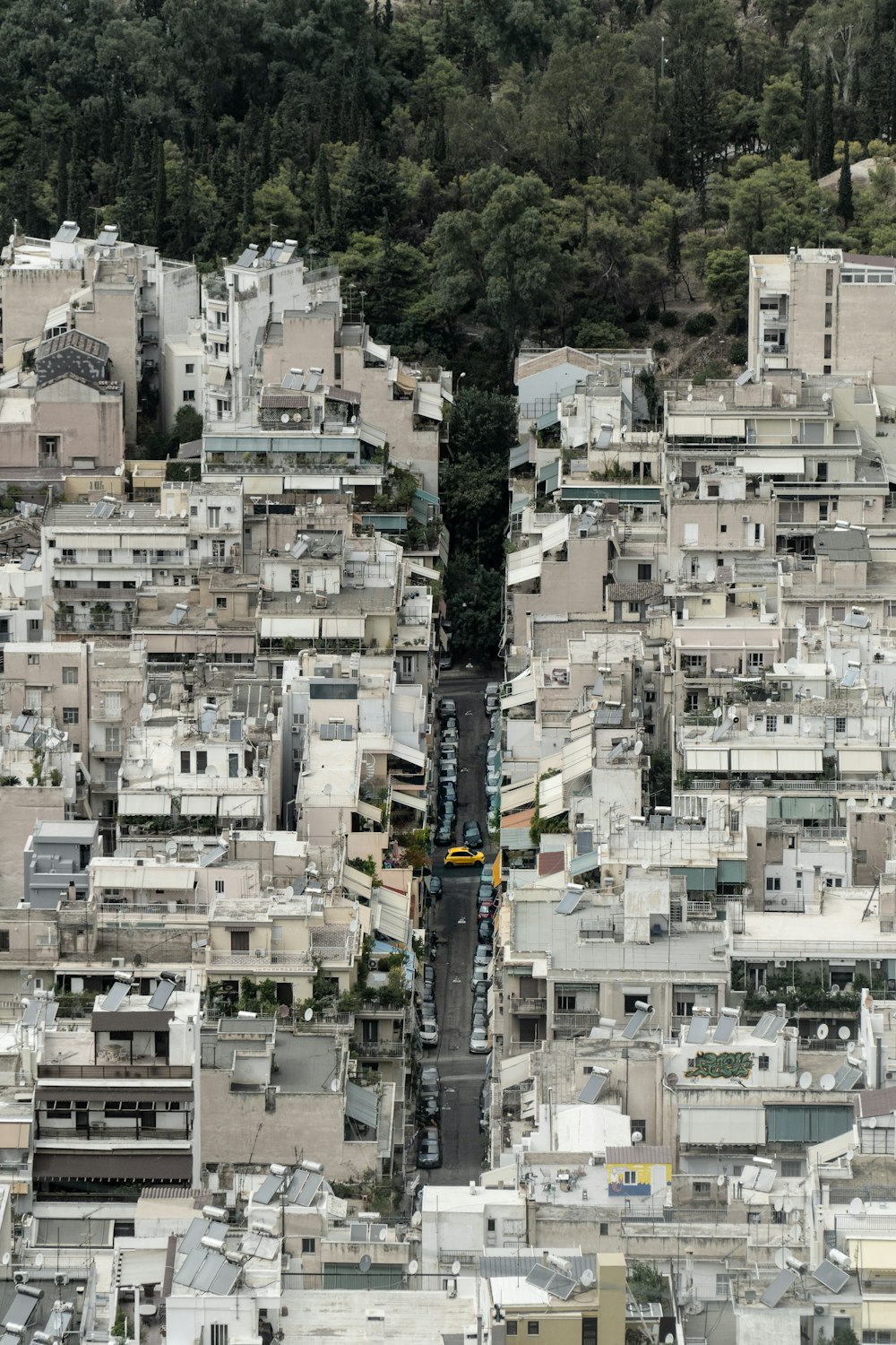 an aerial view of a city with lots of buildings