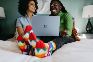 a person sitting on a bed