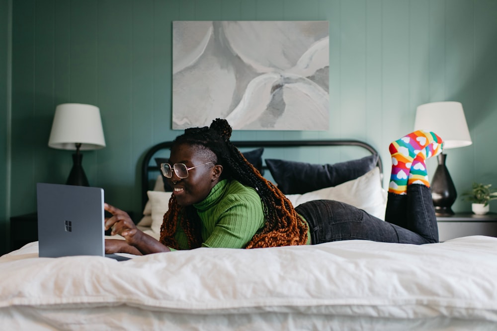 a person lying on a bed