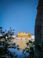 a view of a building from across the water