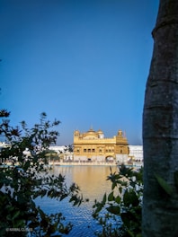 a view of a building from across the water