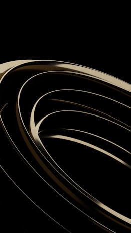 a black and white photo of a curved object