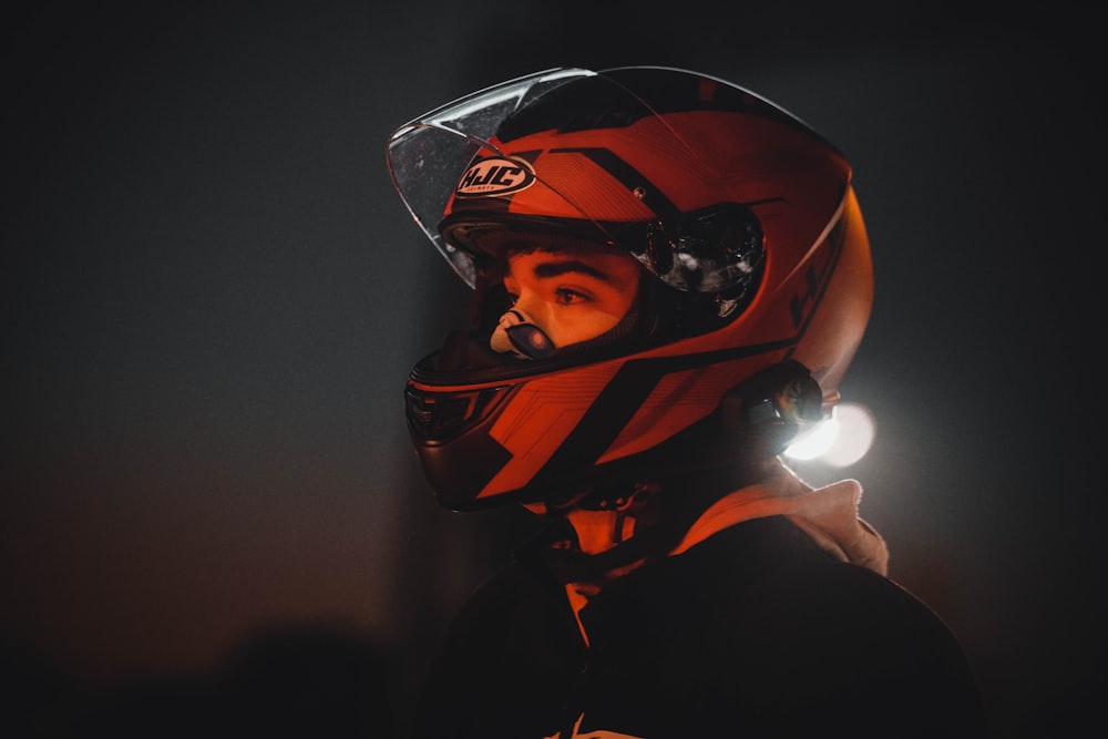 a man wearing a helmet with a light on his head