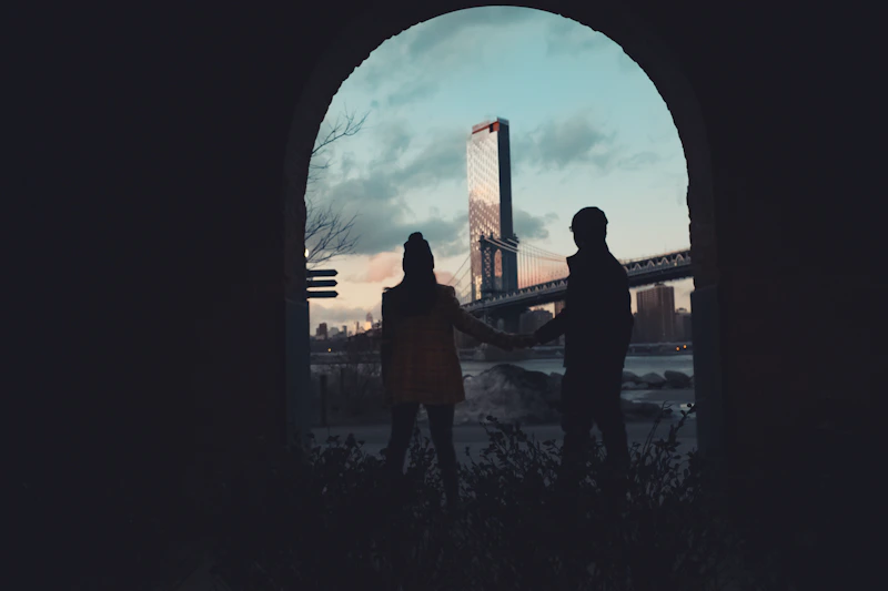 couple sharing a quiet moment by a city window