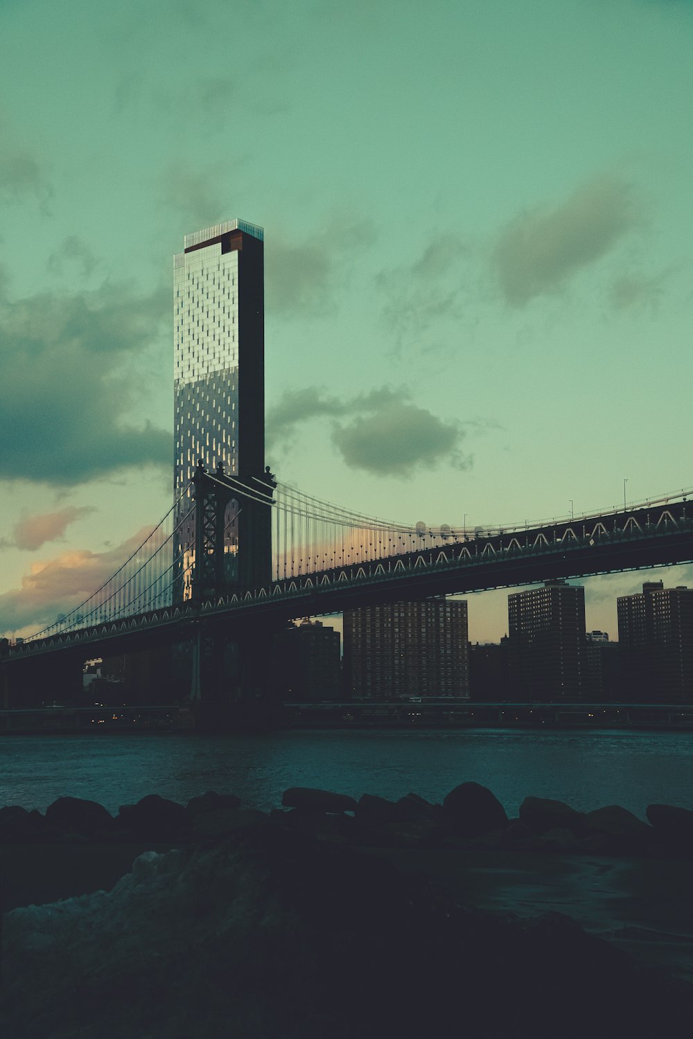 a large bridge spanning over a large body of water