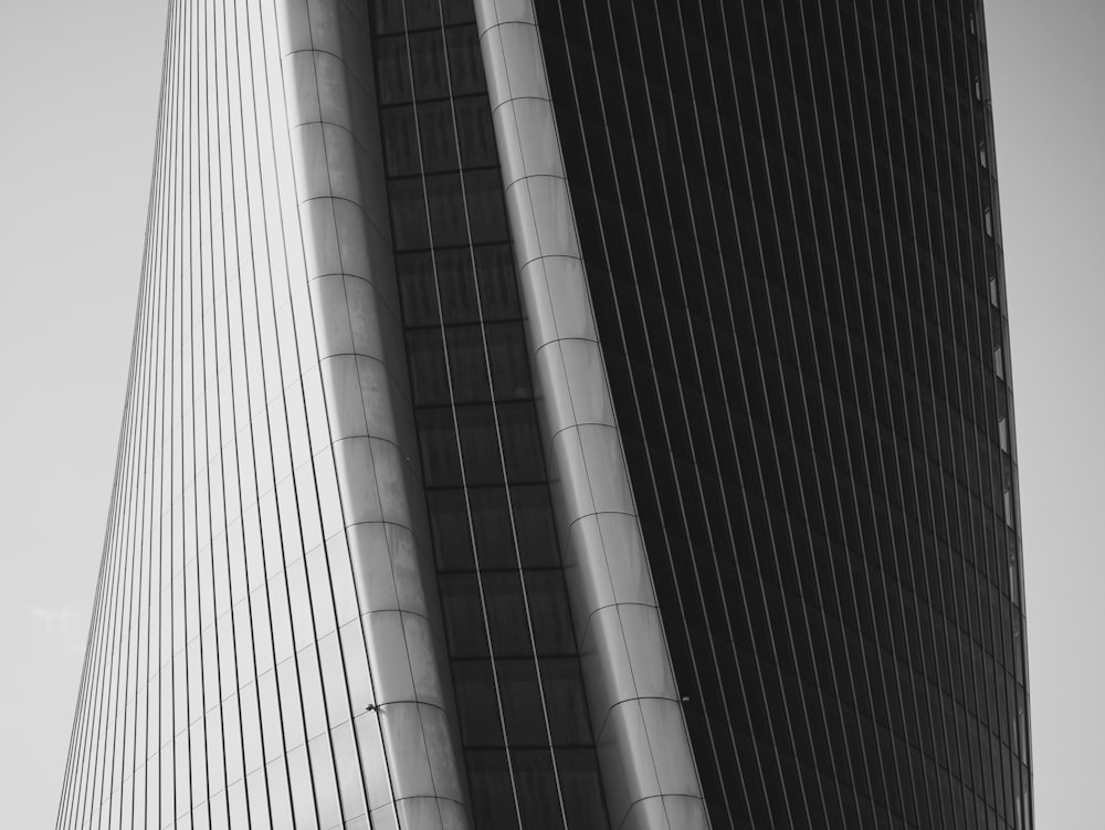 a black and white photo of a tall building