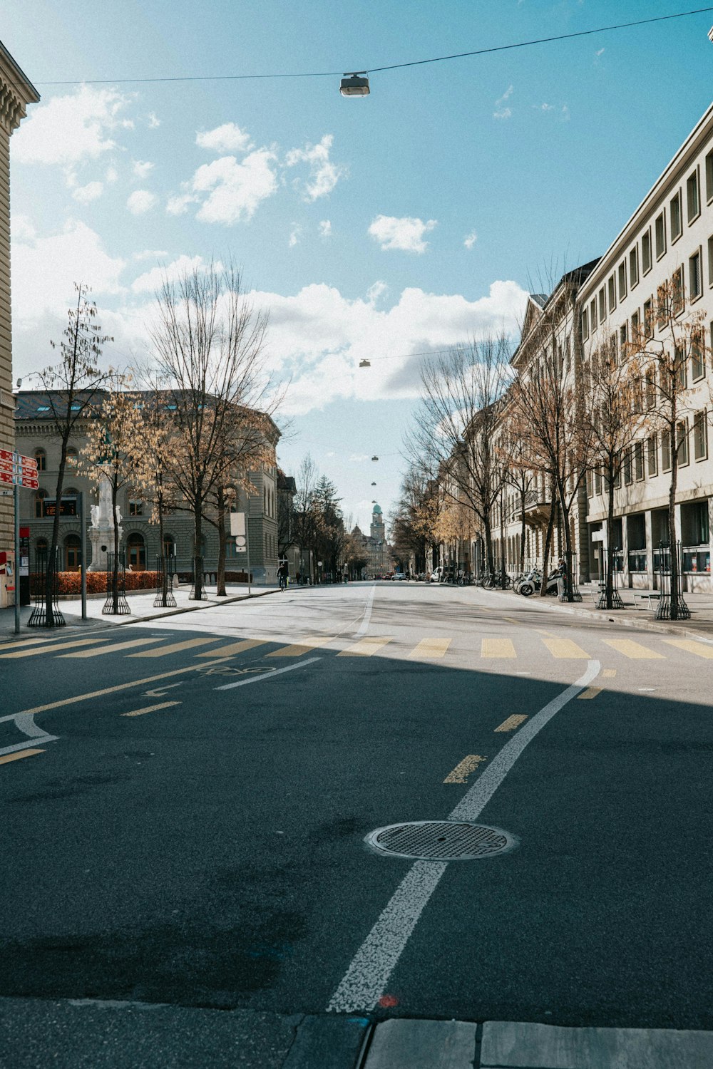 an empty street with buildings on both sides