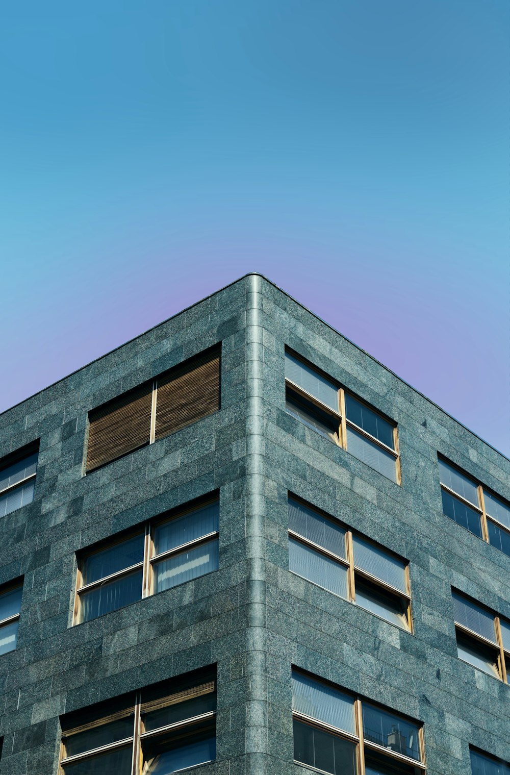 a tall building with lots of windows on top of it