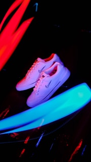 Brightly colored sneakers displayed on a white background.