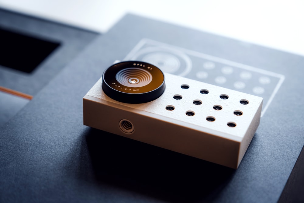 a small camera sitting on top of a table