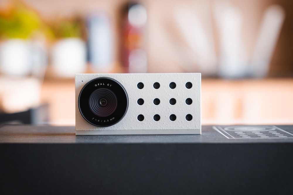 a small camera sitting on top of a table