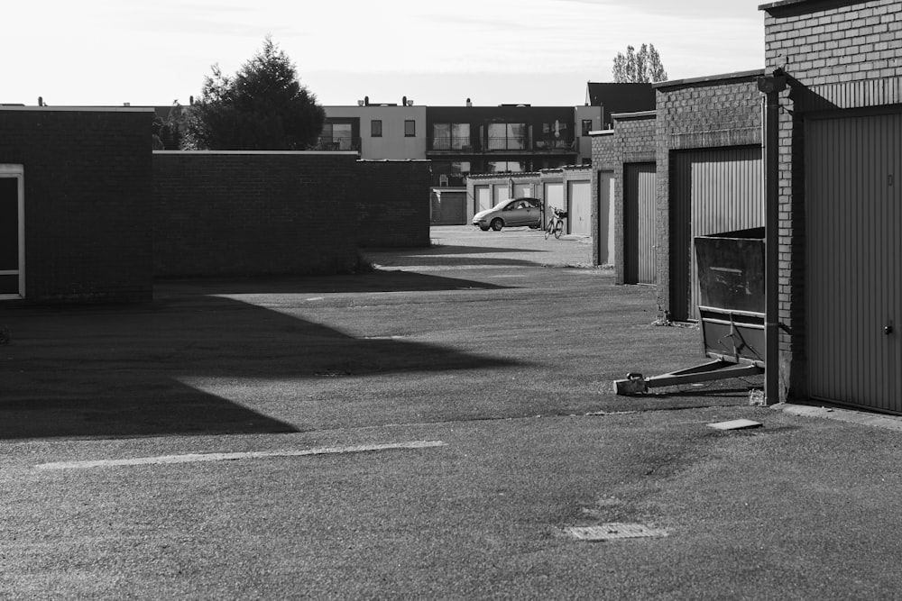 a black and white photo of an empty parking lot