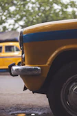 Side view of a taxi with a visible gas tank installed on the rear