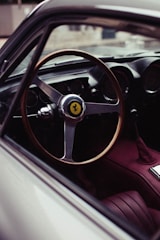 the interior of a car with a steering wheel