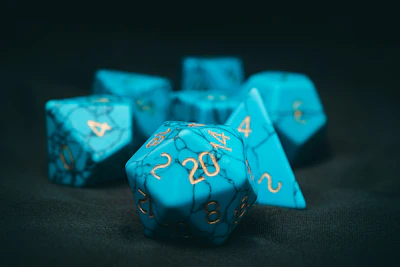 A set of sleek, black dice with glowing runes resting on a textured leather surface.