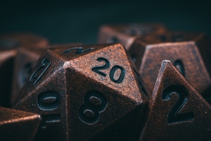 a group of metal dices with numbers on them