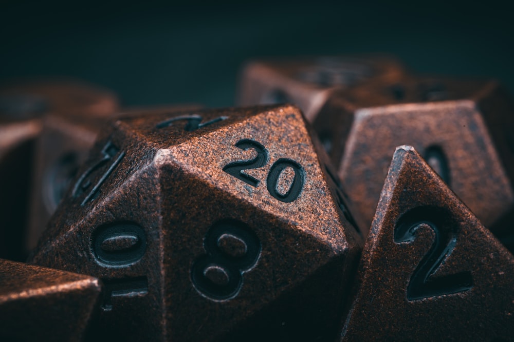 a group of metal dices with numbers on them