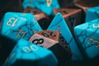 a group of blue and brown dice sitting on top of each other