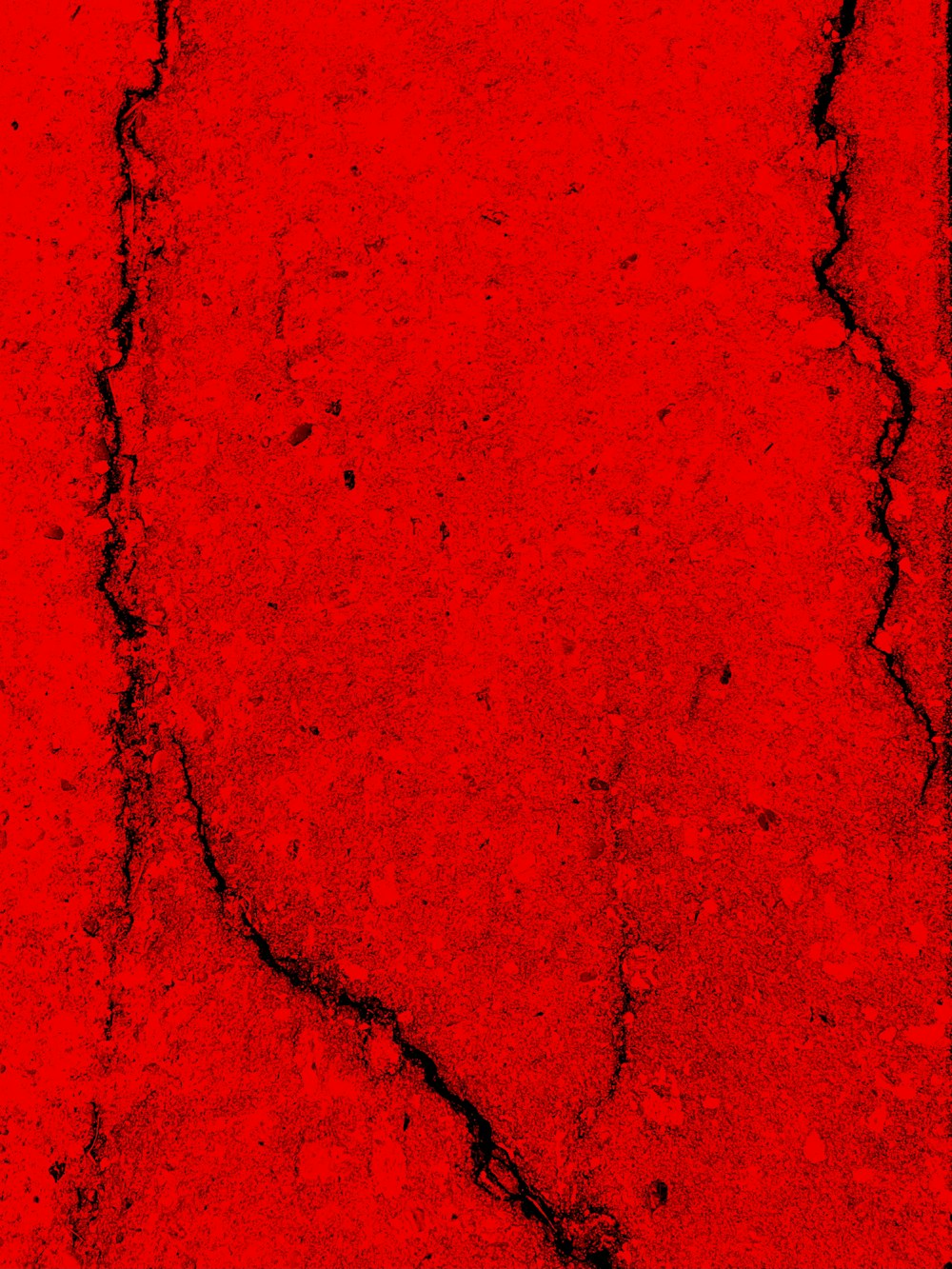 a red background with a crack in the middle