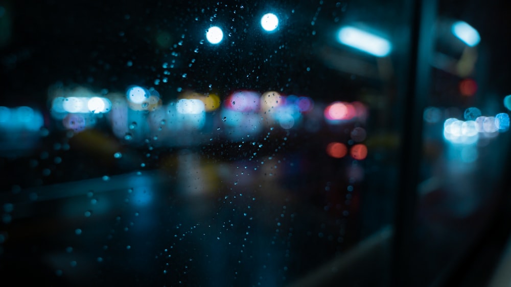 a blurry photo of a city street at night