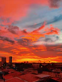 Cinematic urban landscape of Tijuana at sunset with vibrant colors.