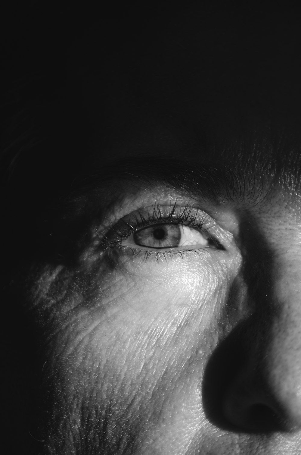 a black and white photo of a man's face