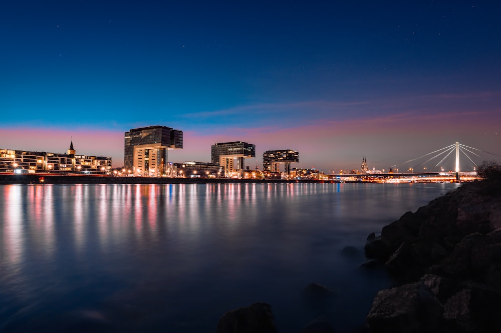 a view of a city at night from across the water