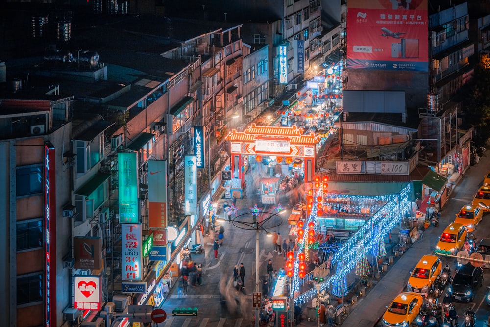 an aerial view of a city street at night