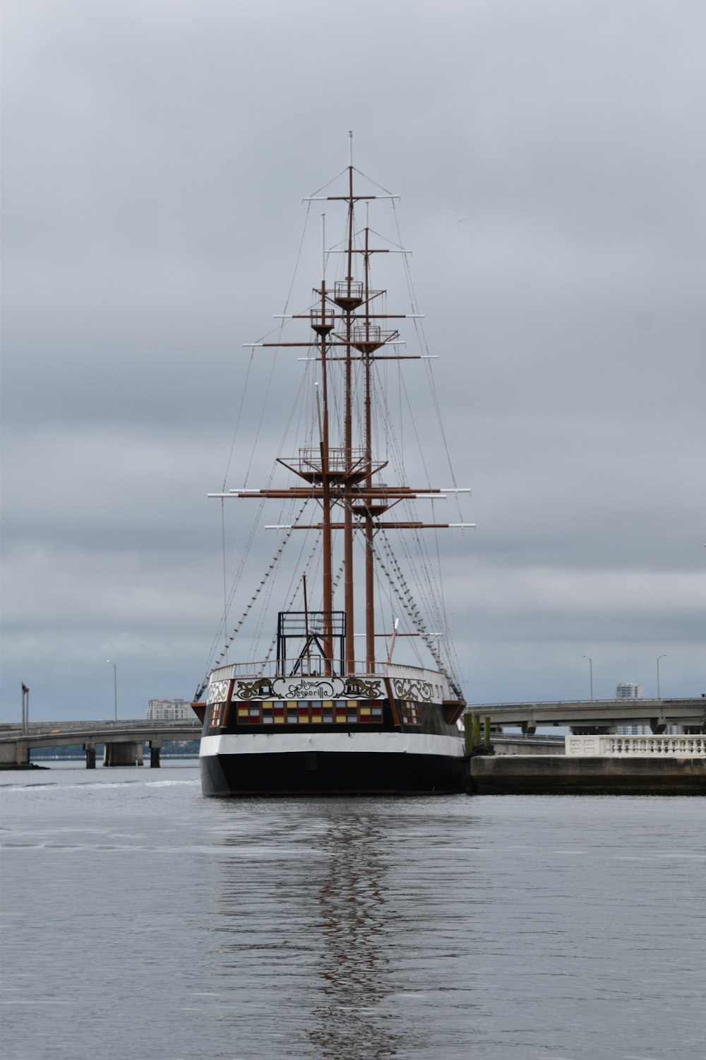 a large boat floating on top of a body of water